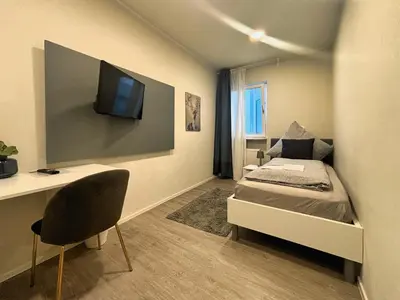 Ein Bett oder Betten in einem Zimmer der Unterkunft HAVENU Hotel Quartier 8