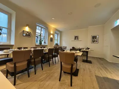 Ein Sitzbereich in der Unterkunft HAVENU Hotel Quartier 8