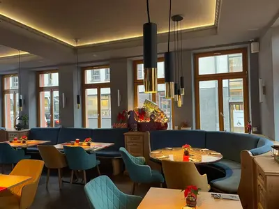 Ein Sitzbereich in der Unterkunft Gasthaus zur krone
