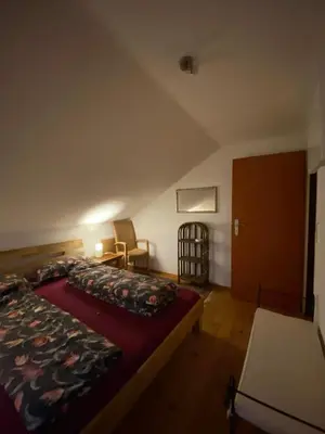 Ein Bett oder Betten in einem Zimmer der Unterkunft Burgblick Stube - Apartment für bis zu 4 Personen - Haustiere willkommen - mit Einbauküche - Fahrradparkplatz etc