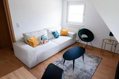 Ein Bett oder Betten in einem Zimmer der Unterkunft G-Living Louis-Hentges32 City & Work Apartment