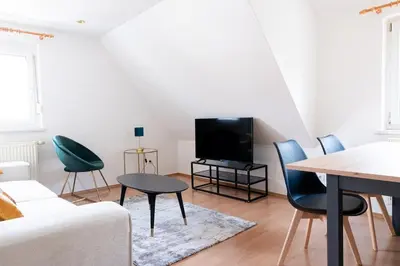 TV/Unterhaltungsangebot in der Unterkunft G-Living Louis-Hentges32 City & Work Apartment