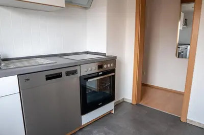 Küche/Küchenzeile in der Unterkunft G-Living Louis-Hentges32 City & Work Apartment