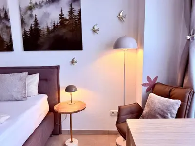 Ein Bett oder Betten in einem Zimmer der Unterkunft Pfalzliebe Suites - Suite Franz, Landau Zentrum
