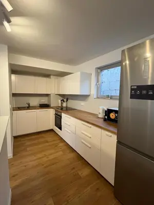 Küche/Küchenzeile in der Unterkunft Moderne Ferienwohnung zentral in Hemsbach