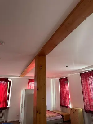 Ein Bett oder Betten in einem Zimmer der Unterkunft Gasthaus Higer