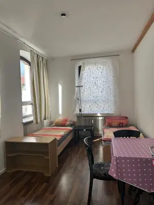 Ein Bett oder Betten in einem Zimmer der Unterkunft Gasthaus Higer