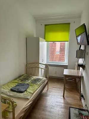 Ein Bett oder Betten in einem Zimmer der Unterkunft Gasthaus Higer