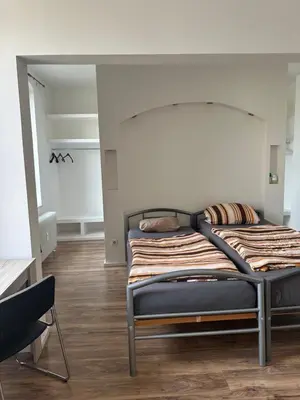 Ein Bett oder Betten in einem Zimmer der Unterkunft Gasthaus Higer