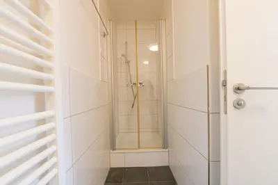 Ein Badezimmer in der Unterkunft G Living Klingenberg153 City und Work Apartment