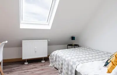 Ein Bett oder Betten in einem Zimmer der Unterkunft G Living Klingenberger153 DG City and Work