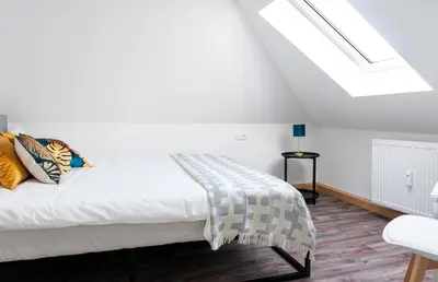 Ein Bett oder Betten in einem Zimmer der Unterkunft G Living Klingenberger153 DG City and Work