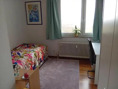 Ein Bett oder Betten in einem Zimmer der Unterkunft Star-In-Rainbow