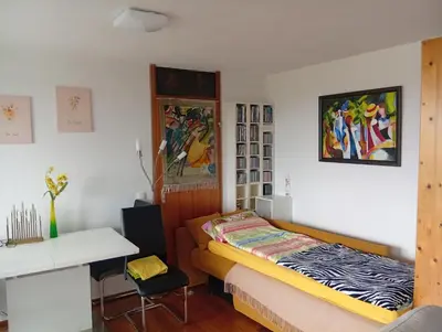 Ein Bett oder Betten in einem Zimmer der Unterkunft Star-In-Rainbow