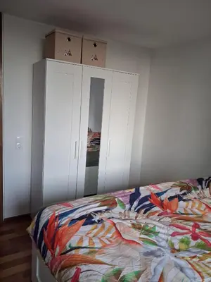 Ein Bett oder Betten in einem Zimmer der Unterkunft Star-In-Rainbow