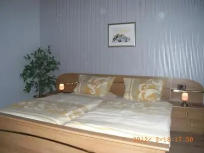 Ein Bett oder Betten in einem Zimmer der Unterkunft Apartment Appartement in Abenheim mit Grill und Terrasse by Interhome