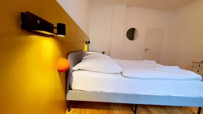 Ein Bett oder Betten in einem Zimmer der Unterkunft Zimmer im Erdgeschoss II