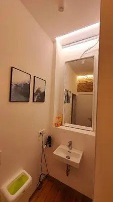 Ein Badezimmer in der Unterkunft Zimmer im Erdgeschoss II