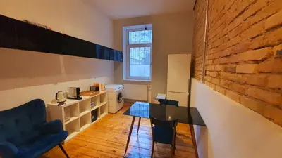 Ein Sitzbereich in der Unterkunft Zimmer im Erdgeschoss II