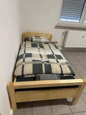 Ein Bett oder Betten in einem Zimmer der Unterkunft Unterkunft für Monteure, ruhige Lage nahe dem Zentrum