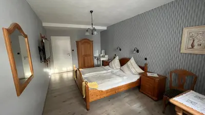 Ein Bett oder Betten in einem Zimmer der Unterkunft Weingut Günther und Gästezimmer