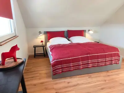 Ein Bett oder Betten in einem Zimmer der Unterkunft Ferienhaus Maias Muthof