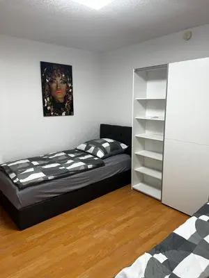 Ein Bett oder Betten in einem Zimmer der Unterkunft KRAICHGAU # 3-ZKB im EG, mit EBK, WLAN, Monteurzimmer, SELF-CHECK-IN