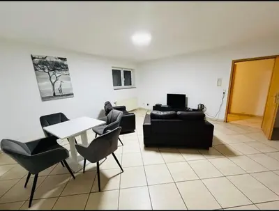 Ein Sitzbereich in der Unterkunft House AL11