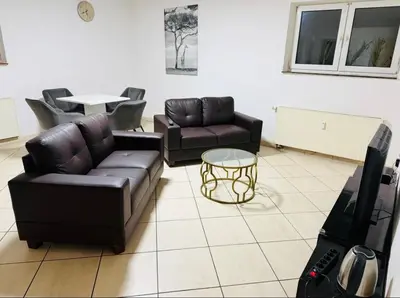 Ein Sitzbereich in der Unterkunft House AL11
