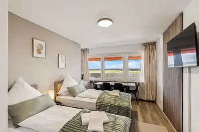 TV/Unterhaltungsangebot in der Unterkunft Skyview Apartment mit Balkon & Parkplatz