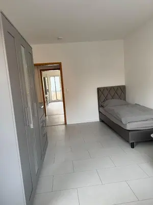 Ein Bett oder Betten in einem Zimmer der Unterkunft Monteurwohnung Lampertheim