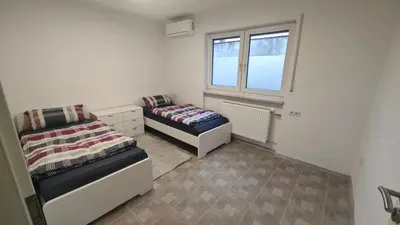 Ein Bett oder Betten in einem Zimmer der Unterkunft Urlaub am Rhein Speyer Hockenheim Mannheim
