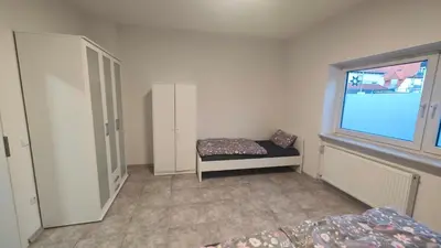 Ein Bett oder Betten in einem Zimmer der Unterkunft Urlaub am Rhein Speyer Hockenheim Mannheim