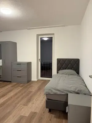 Ein Bett oder Betten in einem Zimmer der Unterkunft Monteurwohnung Mannheim
