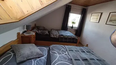 Ein Bett oder Betten in einem Zimmer der Unterkunft Schöne helle Wohnung für 2 Personen