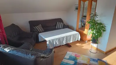 Ein Sitzbereich in der Unterkunft Schöne helle Wohnung für 2 Personen
