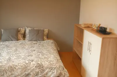 Ein Bett oder Betten in einem Zimmer der Unterkunft Pension am Waldrand