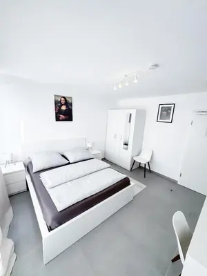Ein Bett oder Betten in einem Zimmer der Unterkunft Durdi - Serviced Apartments - 24h Self-Check-in & Parking