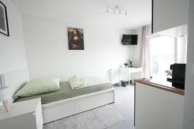 Ein Bett oder Betten in einem Zimmer der Unterkunft Durdi - Serviced Apartments - 24h Self-Check-in & Parking