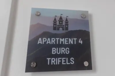 Ein Zertifikat, Auszeichnung, Logo oder anderes Dokument, das in der Unterkunft Möblierte Apartments nähe Speyer ausgestellt ist