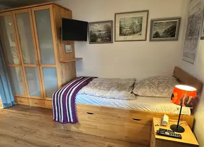 Ein Bett oder Betten in einem Zimmer der Unterkunft Apartment Sonnenschein