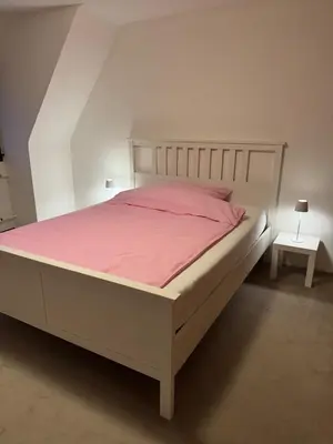 Ein Bett oder Betten in einem Zimmer der Unterkunft Haus Boom in Dreieich, sehr ruhig gelegen, Nähe Frankfurt City und Messe, Frankfurt Flughafen, Golf Club