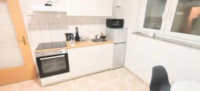 Küche/Küchenzeile in der Unterkunft Haus15T