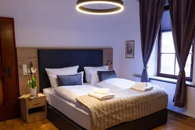Ein Bett oder Betten in einem Zimmer der Unterkunft Schloss Höfingen