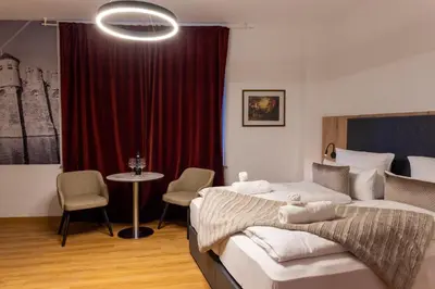 Ein Bett oder Betten in einem Zimmer der Unterkunft Schloss Höfingen