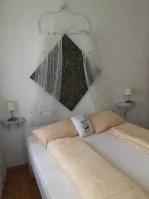 Ein Bett oder Betten in einem Zimmer der Unterkunft Vivo-Vino