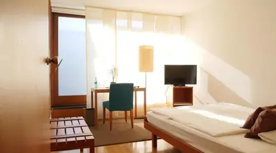 Ein Bett oder Betten in einem Zimmer der Unterkunft Hotel Prinz Carl