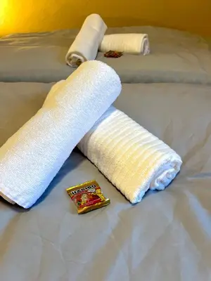 Ein Bett oder Betten in einem Zimmer der Unterkunft Pixies First - Ihr Wohlfühl-Apartment