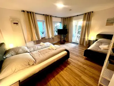 Ein Bett oder Betten in einem Zimmer der Unterkunft Pixies First - Ihr Wohlfühl-Apartment