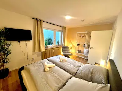 Ein Bett oder Betten in einem Zimmer der Unterkunft Pixies First - Ihr Wohlfühl-Apartment